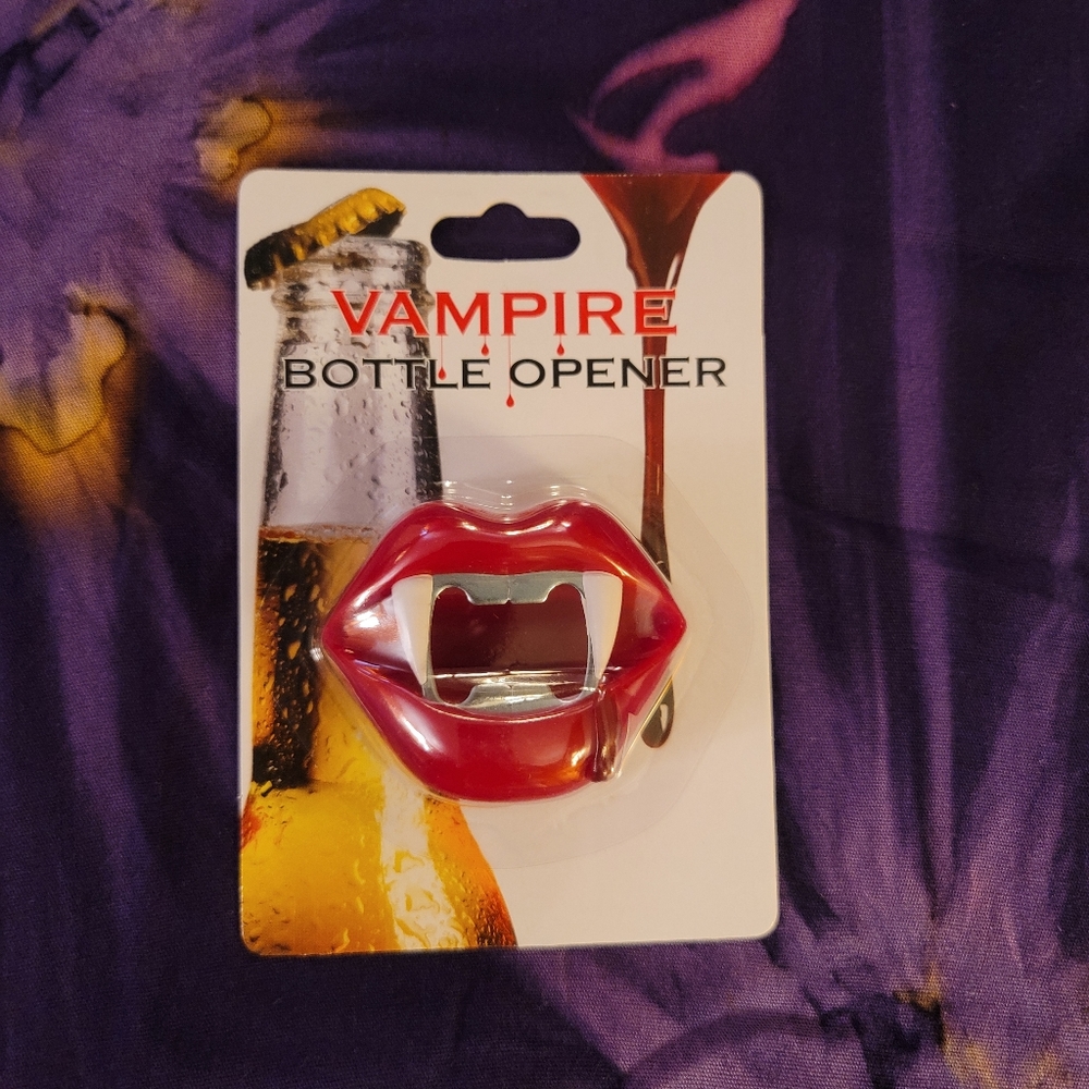 Brand New in Package. Vampire Bottle Opener.